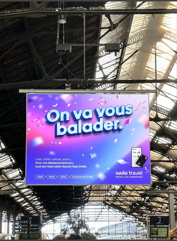Affiche suspendue dans une gare : « On va vous balader. »
